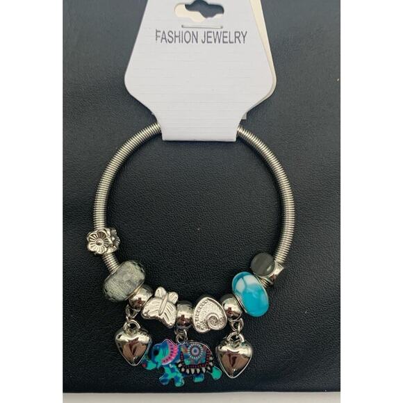 NWT Silver Tone And Aqua Blue Elephant Charm Stretch Bracelet - Picture 1 of 3